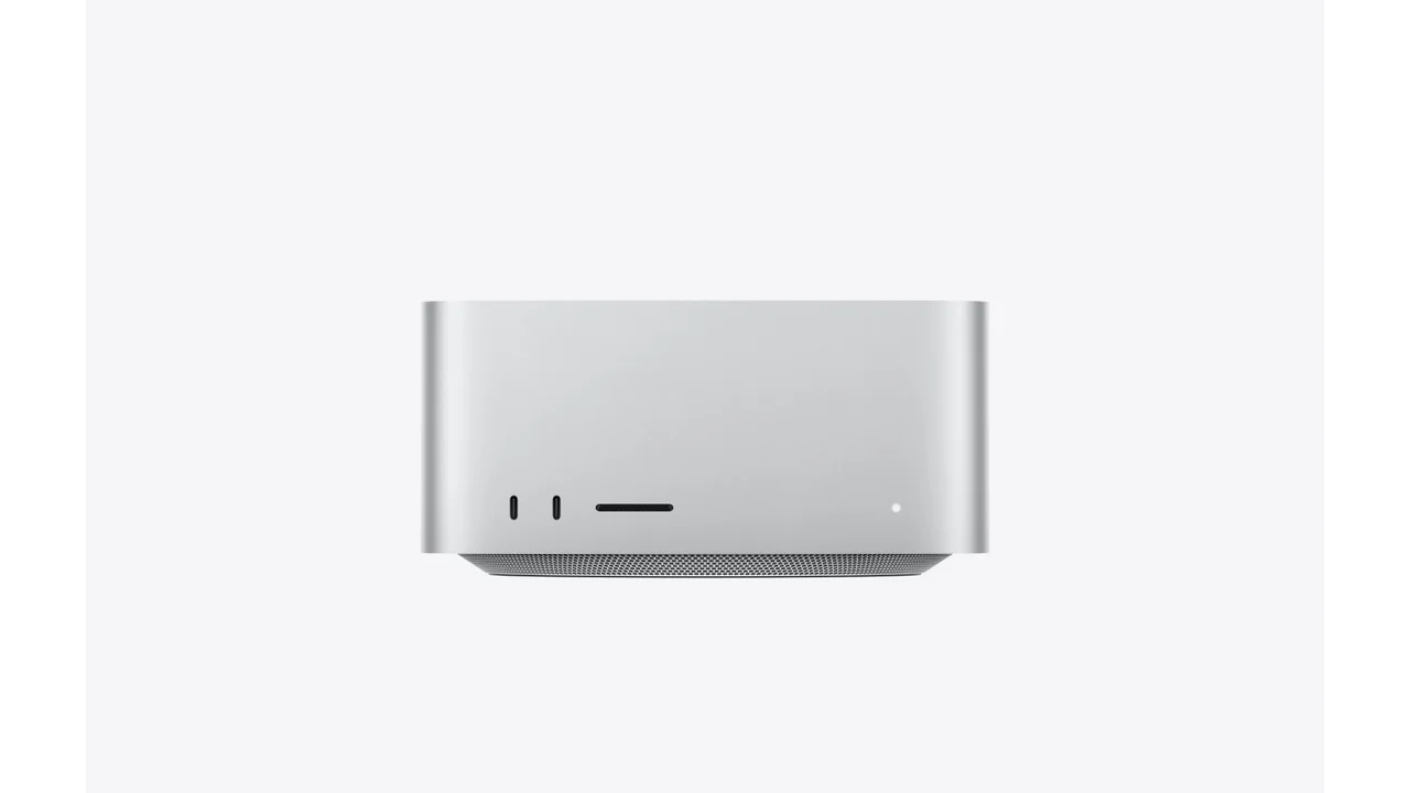 Apple Mac Studio M3 Ultra on display in an Apple Store, showing the recognisable squat aluminium chassis and Apple logo on the top face.